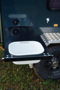 Camper trailer preparation table and sink